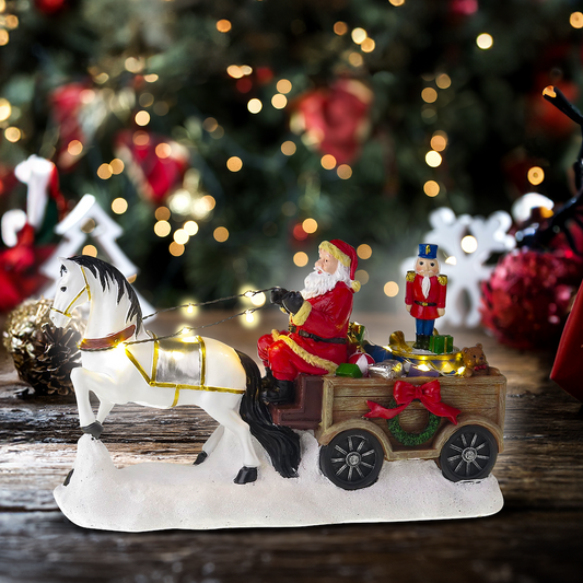 Weihnachtsmann mit weißem Pferd, Wagen und rotierendem Nussknacker